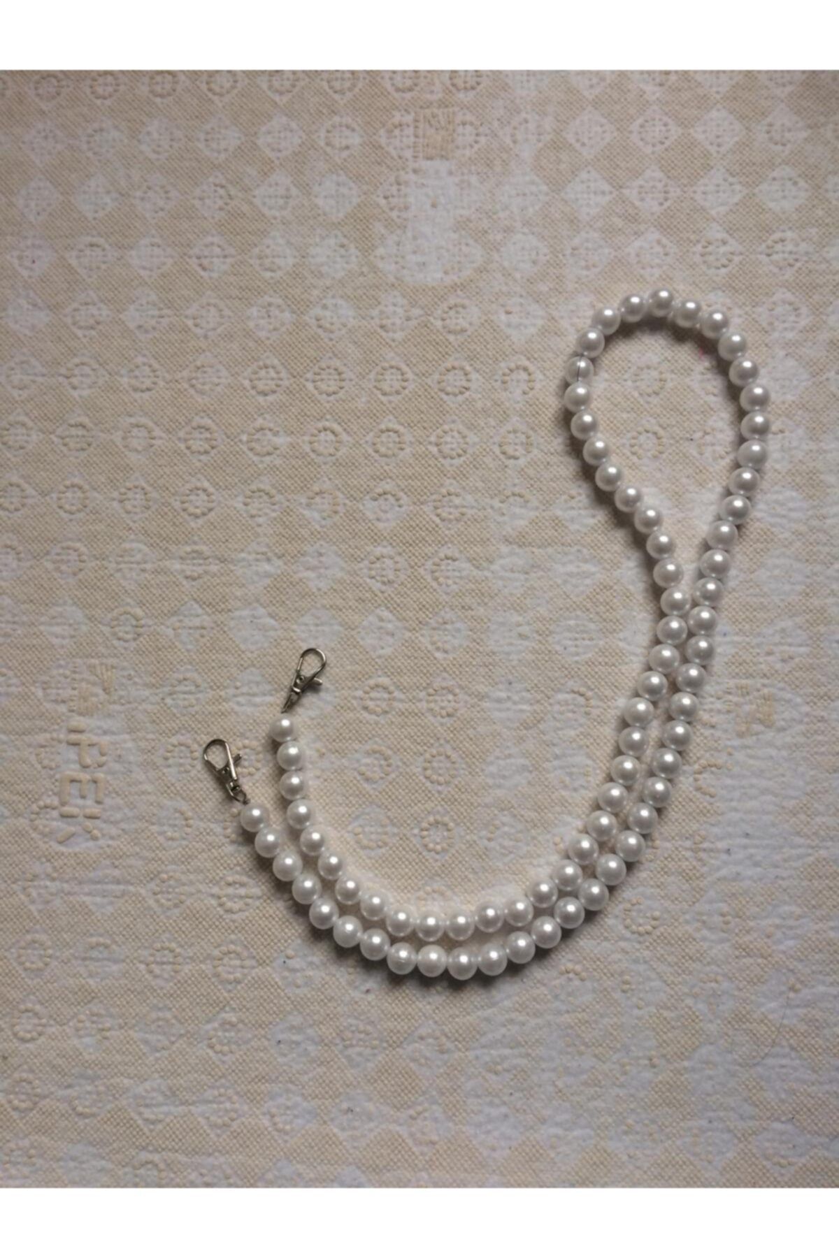 Pearl store bag strap
