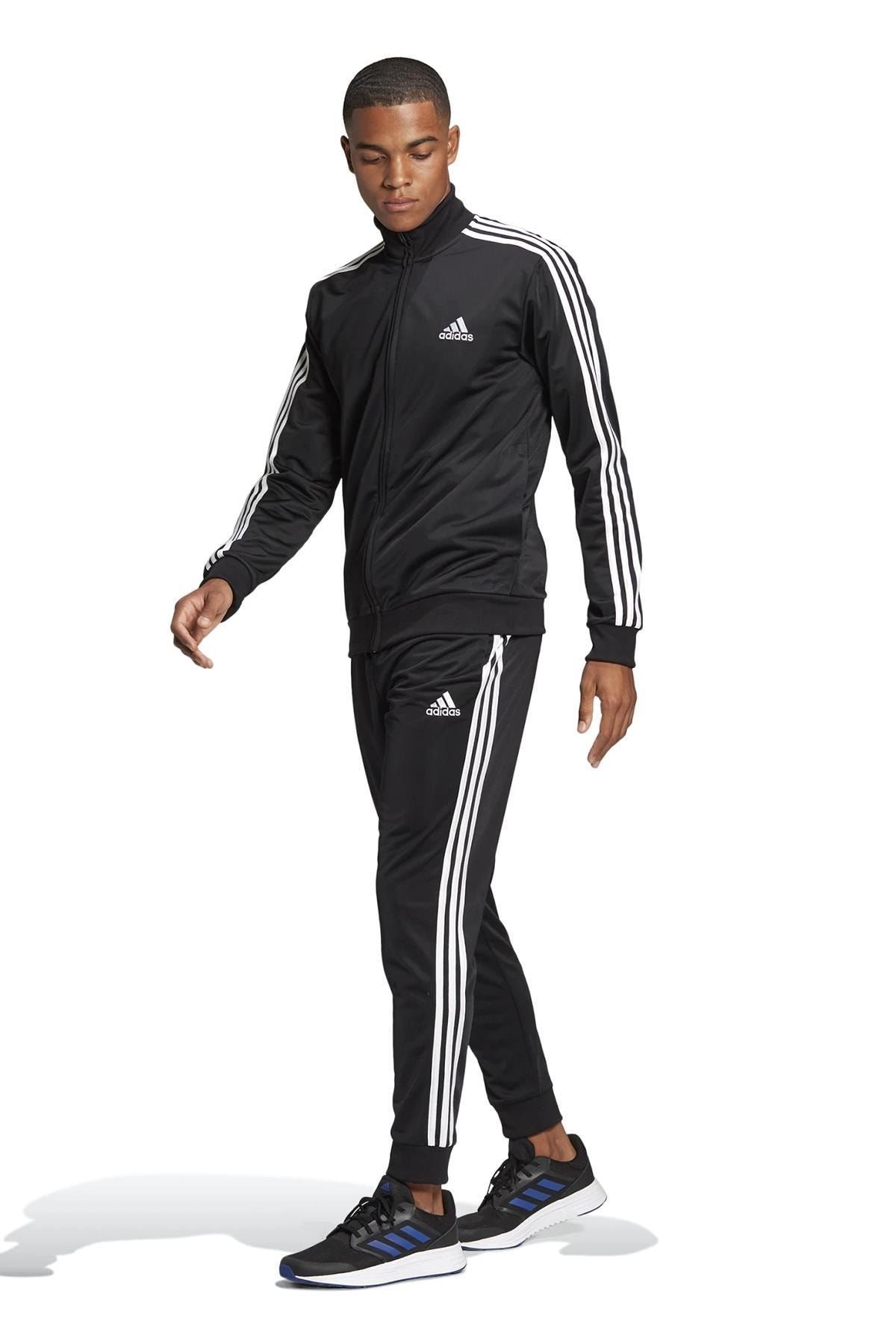 Grey adidas tracksuit shop with white stripes