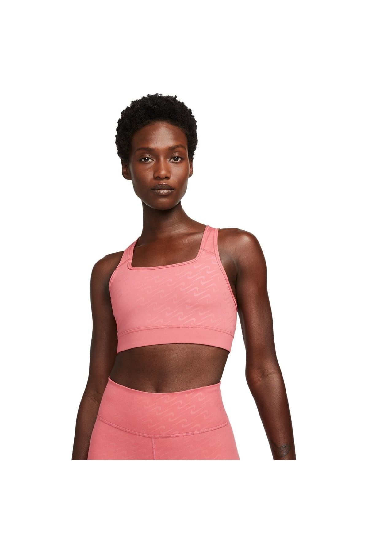 Nike Women's sports bra polyester/spandex blend medium pad icon clash bra  black/orange, Women's Fashion, Activewear on Carousell