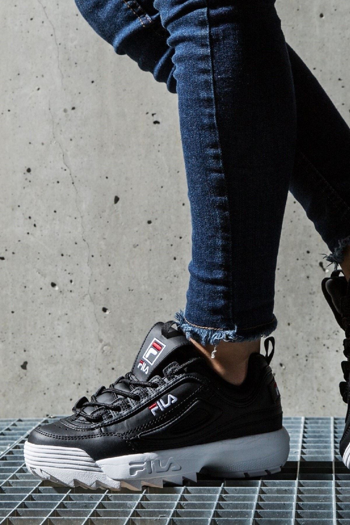 Fila disruptor low sale