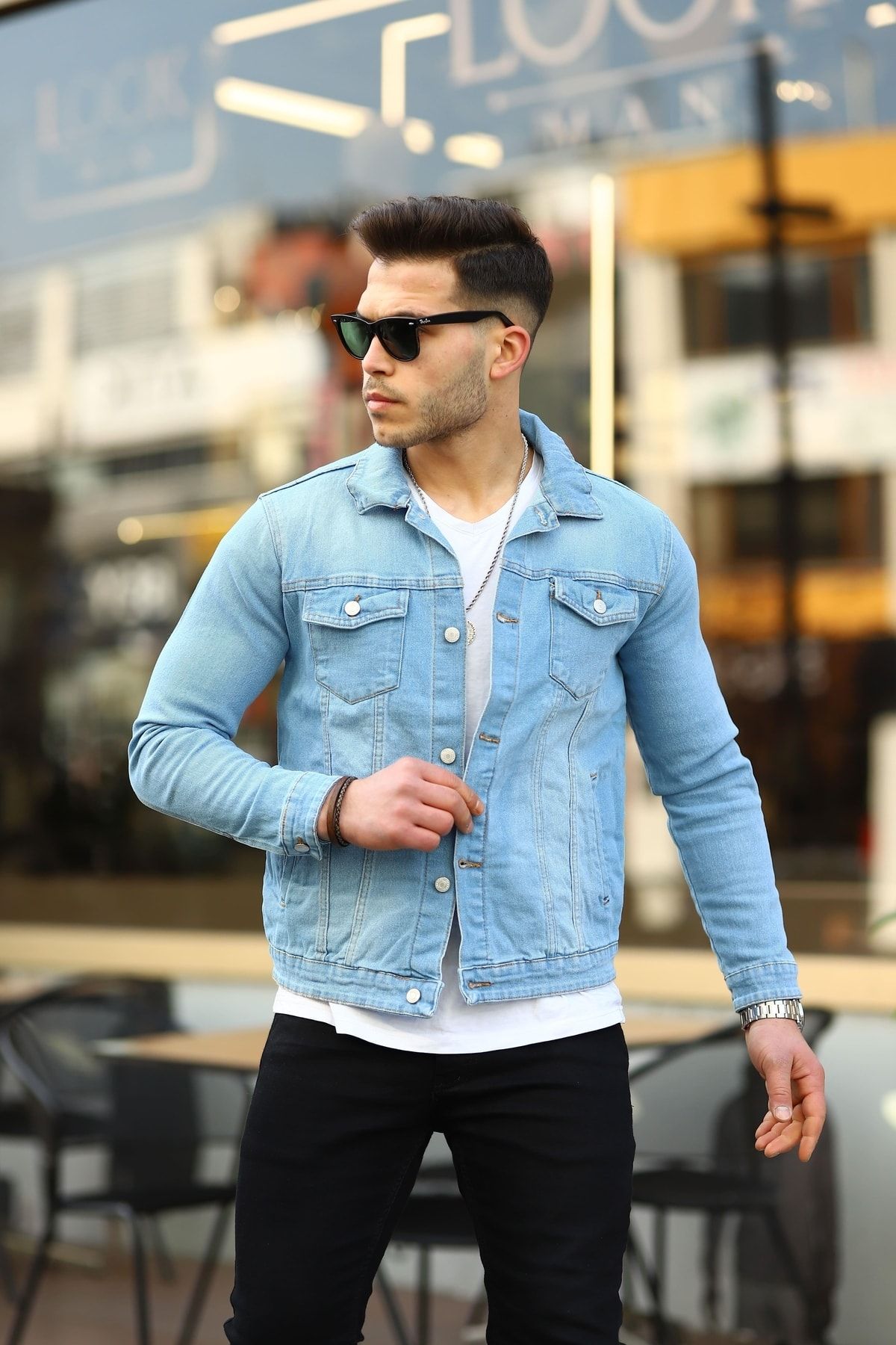 Premium Photo | Stylish guy standing street in a denim jacket against men's  looks