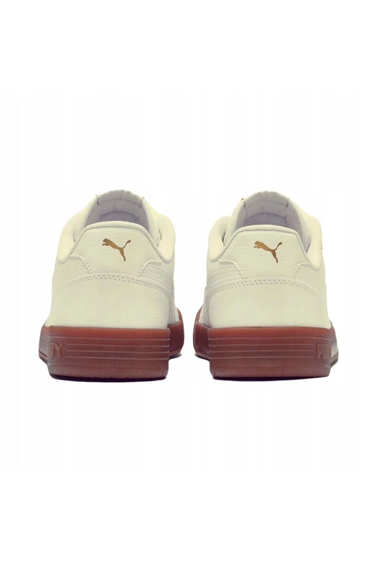 Gold low top pumas best sale