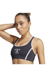 Obrázek souvisejícího produktu adidas Tílka