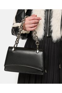 Related product image Twist Shoulder Bags
