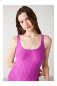 Related product image Kom Swimsuits