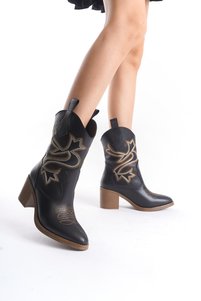 Related product image Modabuymus Boots
