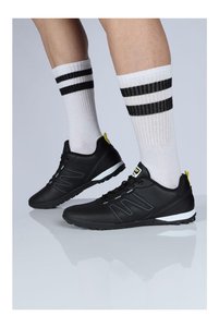 Related product image Jump Soccer Shoes