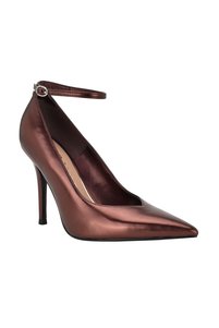 Related product image Guess Pumps