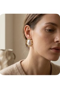 Related product image Ustaeller Steel Earrings