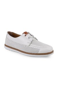 Related product image Libero Flats