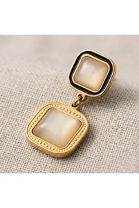 Related product image Siya Silver Steel Earrings
