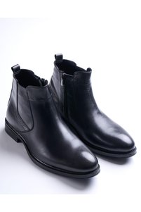 Related product image TerziAdemAltun Boots