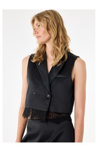 Related product image Koton Vests