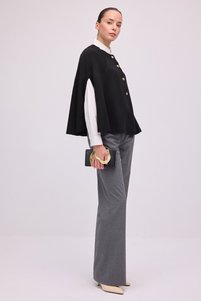 Related product image Touche Prive Ponchos