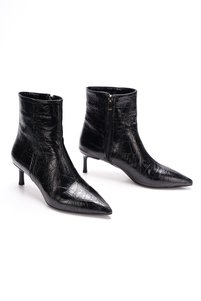 Related product image PASSAGE SHOES Boots