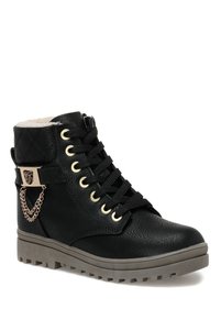 Related product image Kinetix Boots