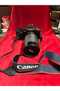 TAYFUNTUFAN ANTİKA CANON T70 FİLMLİ FOTOĞRAF MAKİNESİ ÇALIŞIR DURUMDA ürün fotoğrafı