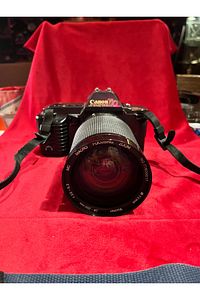 TAYFUNTUFAN ANTİKA CANON T70 FİLMLİ FOTOĞRAF MAKİNESİ ÇALIŞIR DURUMDA ürün fotoğrafı
