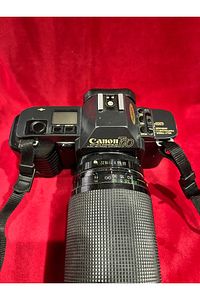 TAYFUNTUFAN ANTİKA CANON T70 FİLMLİ FOTOĞRAF MAKİNESİ ÇALIŞIR DURUMDA ürün fotoğrafı