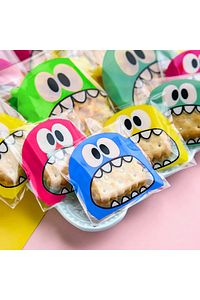 100 Adet Karşık Canavar Desenli Cake Pops Ve Kurabiye Poşeti 10x15 Cm Kendinden Yapışkanlı ürün fotoğrafı