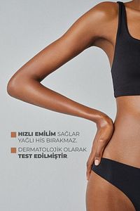 Bronzlaştırıcı Yağ Nemlendirici ve Besleyici ürün fotoğrafı
