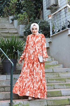 Sfg Life Moda KADIN TESETTÜR YAKASI ÖNDE PÜSKÜL VE KOL UCU LASTİKLİ DOKUMA VİSKON KUMAŞ EBRU DESENLİ ELBİSE