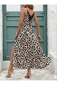 Kokosh moda Kadın Yuvarlak Yaka Sırt Detaylı Yırtmaçlı Uzun Desenli Yazlık Süprem Elbise