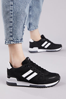 حذاء رياضي أسود أبيض للجنسين Tb282