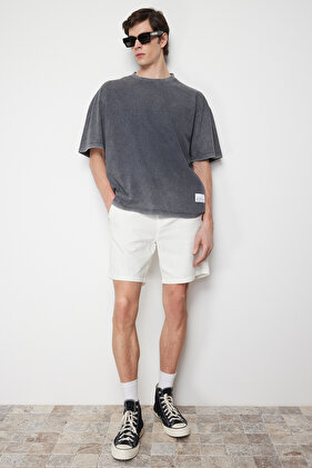 تي شيرت أنثراسايت كبير الحجم/واسع مع تأثير باهت وفتحة 100% قطن TMNSS24TS00005