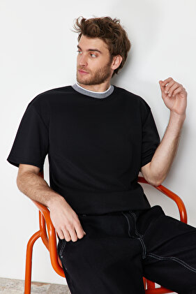 Premium schwarzes Oversize/Trikot-T-Shirt mit breitem Schnitt und Struktur aus Piqué mit Bändern TMNSS23TS00079