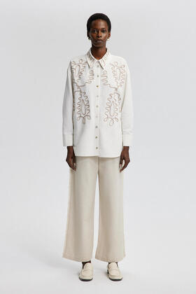 قميص - تفاصيل التطريز