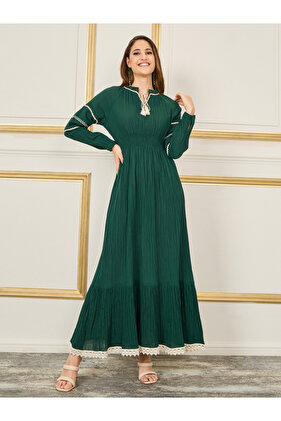 فستان ماكسي مزين بتطريزات وياقة مربوطة