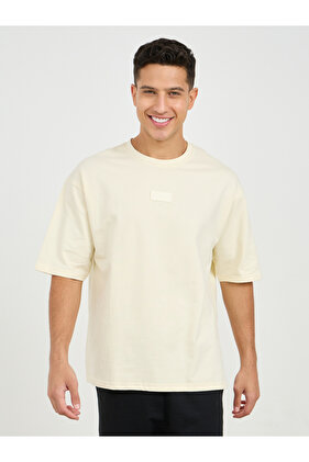 تي شيرت تيري مزين بشارة السيليكون كبيرة الحجم