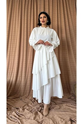 فستان بطبقات منقوشة بحزام وردي