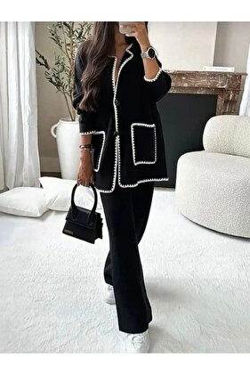 مجموعة ملابس تريكو سوداء فاخرة مع تفاصيل جيب وملابس الراعي