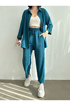 طقم قميص علوي وأكمام مزدوجة باللون الأخضر البترولي للسيدات