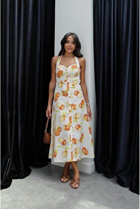 فستان منقوش باللون البرتقالي من إكرو