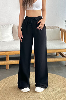 Lniane spodnie damskie na lato - elastyczny pas, kieszenie, szeroki krój