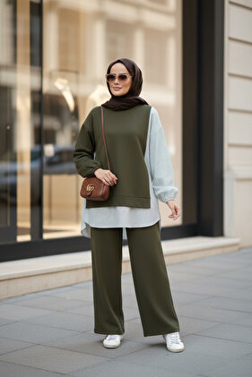 طقم أخضر مزدوج مع تفاصيل قميص الخط