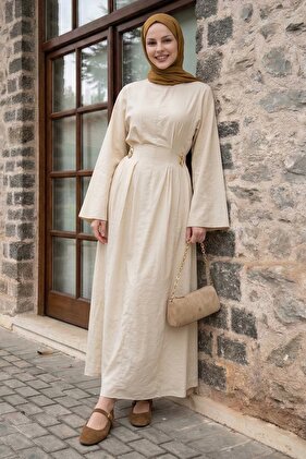 Beige Dress with Gold Brooch and Belt Modal