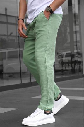 شلوار سبز مردانه بافتنی فاق بلند پاچه لوله ای کتان ریلکس کد 716349853