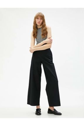 شلوار جین مشکی زنانه پاچه گشاد فاق بلند کاپری کد 695648241