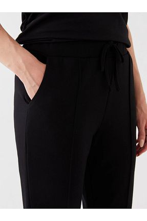 شلوار کرمگن سبز زنانه پاچه لوله تفنگی LC Waikiki - کد 787364919