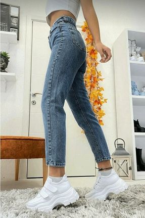 شلوار جین آبی زنانه پاچه تنگ فاق بلند پارچه ای ساده بلند کد 634627847