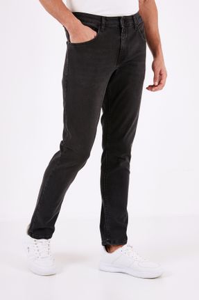 شلوار جین مشکی مردانه پاچه لوله ای فاق بلند پنبه (نخی) کد 810339653
