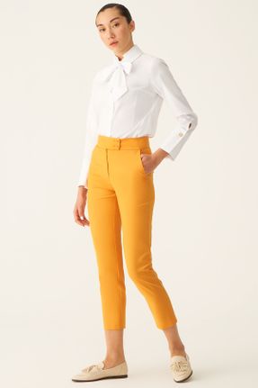 شلوار زرد زنانه فاق بلند پاچه لوله ای بافتنی رگولار کد 332703571