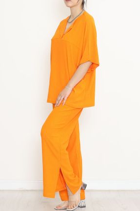 ست نارنجی زنانه بافت لیکرا اورسایز فاق بلند کد 820329454