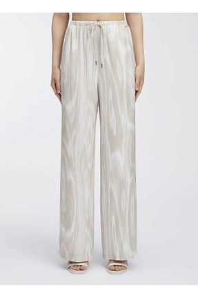 شلوار بژ زنانه پارچه Calvin Klein - کد 827857194
