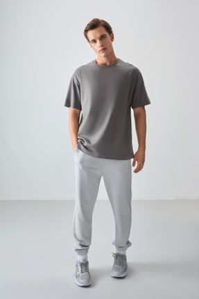 تی شرت طوسی مردانه اورسایز یقه گرد پنبه - پلی استر تکی بیسیک کد 808520995