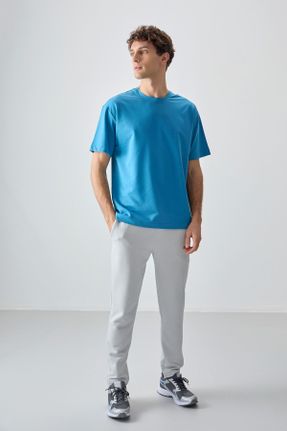 تی شرت آبی مردانه یقه گرد پنبه - پلی استر اورسایز تکی بیسیک کد 811844086